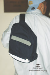 “Extra-THISWAY” sling bag